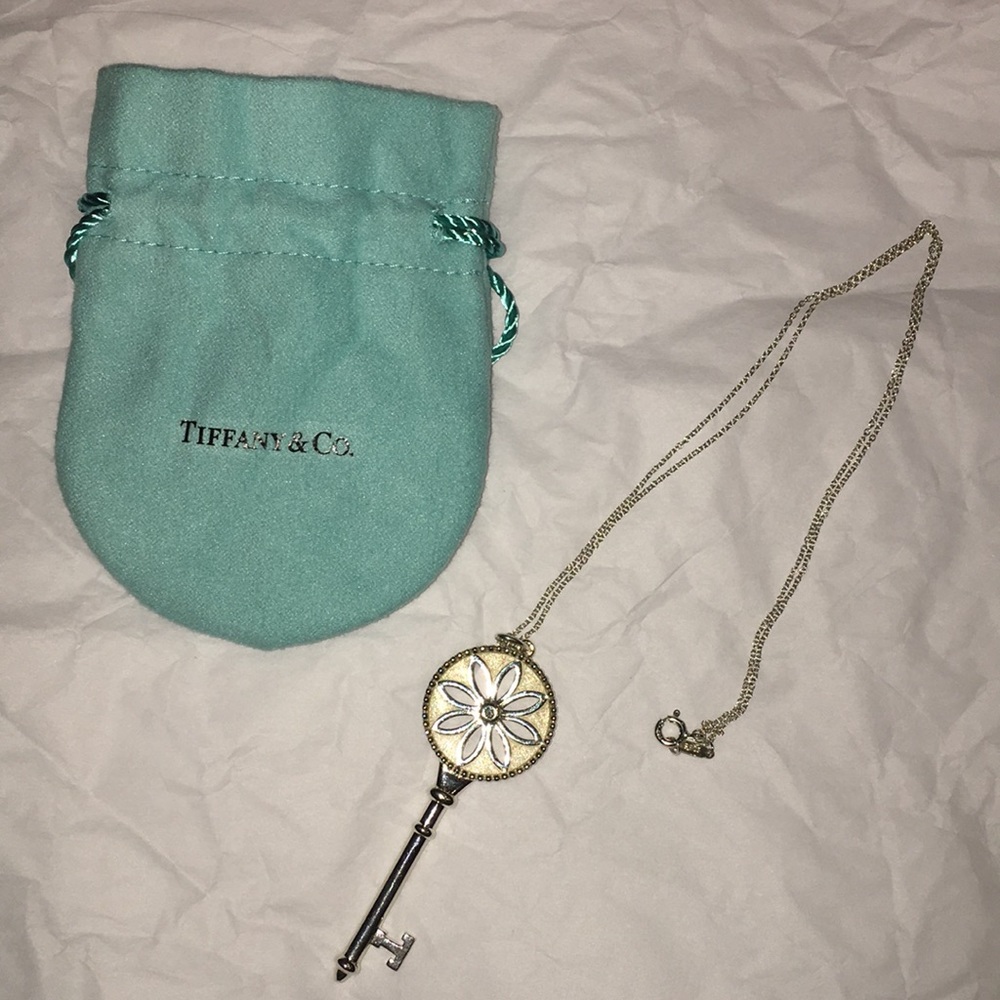 Genuine Tiffany & Co flower Daisy  key w’ diamond